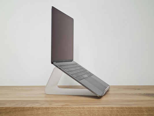 The "Silicone Coaster Laptop Elevation": How to prevent laptop thermal throttling on a flat desk without a bulky stand