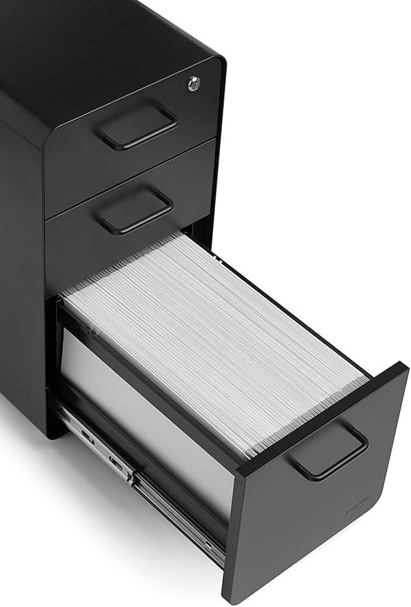 Poppin Slim Stow 3-Drawer File Cabinet - Black. 2 Utility Drawers and 1 Vertical Hanging File Drawer. Fully Painted Inside and Out. Powder-Coated Steel. Two Keys Included