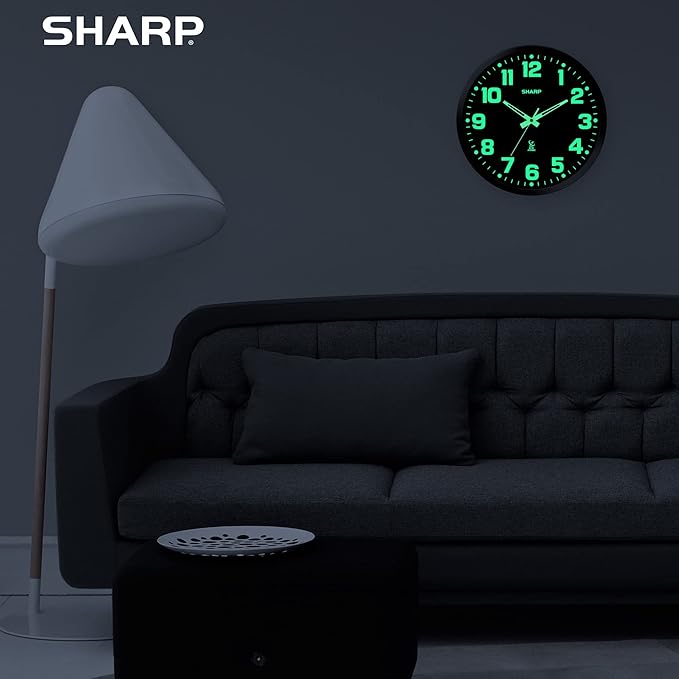 Sharp Glow in the Dark Atomic Analog Wall Clock - 12" Clock with Black Frame - Sets Automatically - Battery Operated - Easy to Read - Easy to Use – See Day or Night!