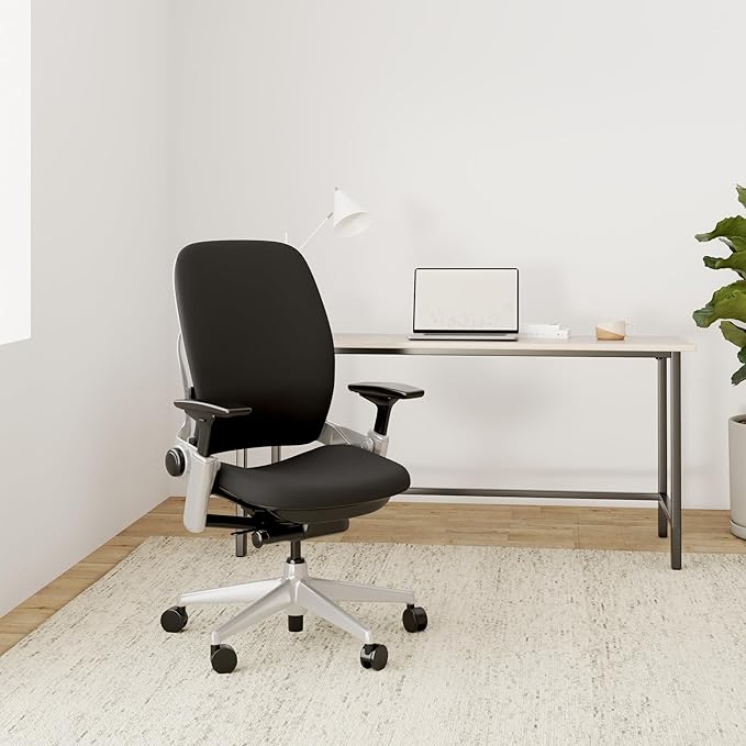 Steelcase Leap Office Chair - Ergonomic Work Chair with Wheels for Hard Flooring - Supports Unique Body Shape - with Natural Glide System & Liveback Technology - Licorice Black Fabric