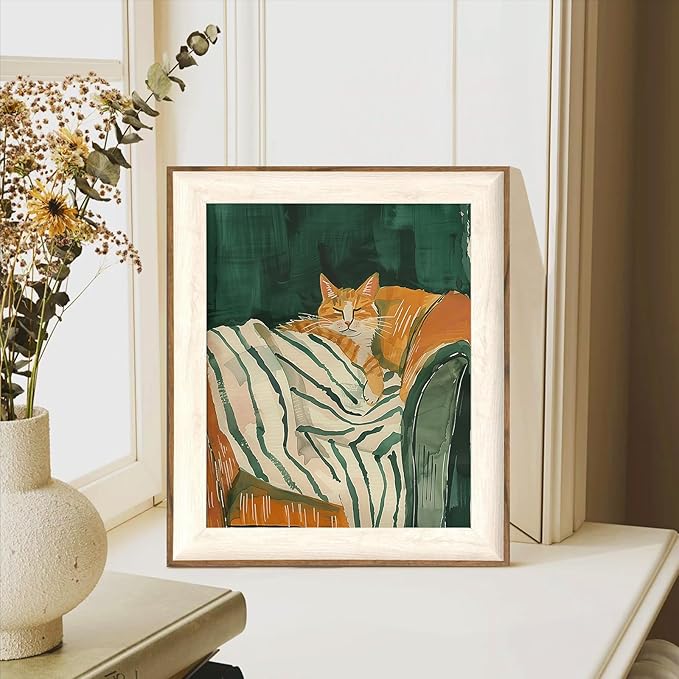 ASTRDECOR Minimalist Framed Wall Art - Cozy Cat Sleeping on Couch with Vintage Green & White Striped Blanket, Trendy Cute Orange Cat Canvas Posters, Modern Aesthetic Bedroom Apartment or Living Room Décor 10x12Inch