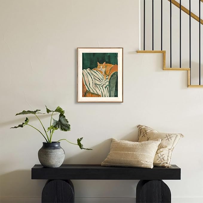 ASTRDECOR Minimalist Framed Wall Art - Cozy Cat Sleeping on Couch with Vintage Green & White Striped Blanket, Trendy Cute Orange Cat Canvas Posters, Modern Aesthetic Bedroom Apartment or Living Room Décor 10x12Inch