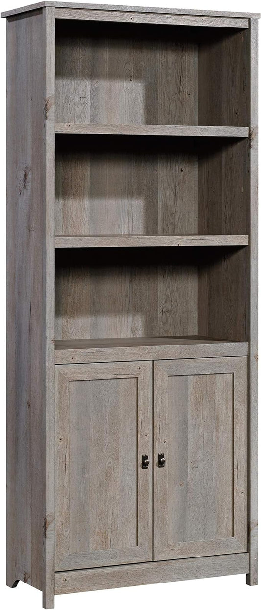Sauder Cottage Road Book Shelf, Bookshelf with Storage, Library Bookcase with Doors and Adjustable Shelves, in Mystic Oak Finish