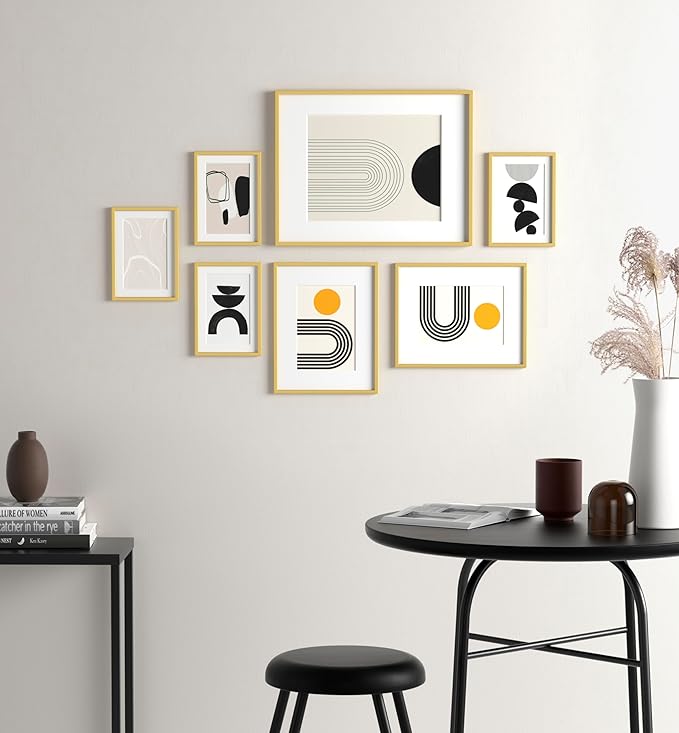 eletecpro Aluminum Gallery Wall Frame Set of 7, Including 1Pc 11x14, 2Pcs 8x10, 4Pcs 5x7 Photo Frames for Wall or Tabletop Display, Multiple Sizes Picture Frames Collage Wall Decor, Gold