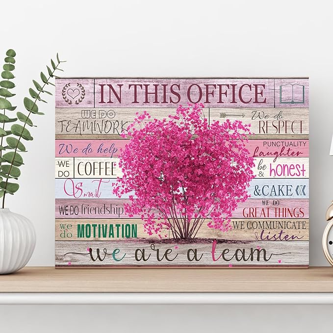 WOWGOOMO Pink Motivational Wall Art for Women Positive Sayings In This Office We Are A Team Flower Tree Picture Poster Modern Entrepreneur Wall Art Home Office Workspace Decoration Framed 12x16 Inch