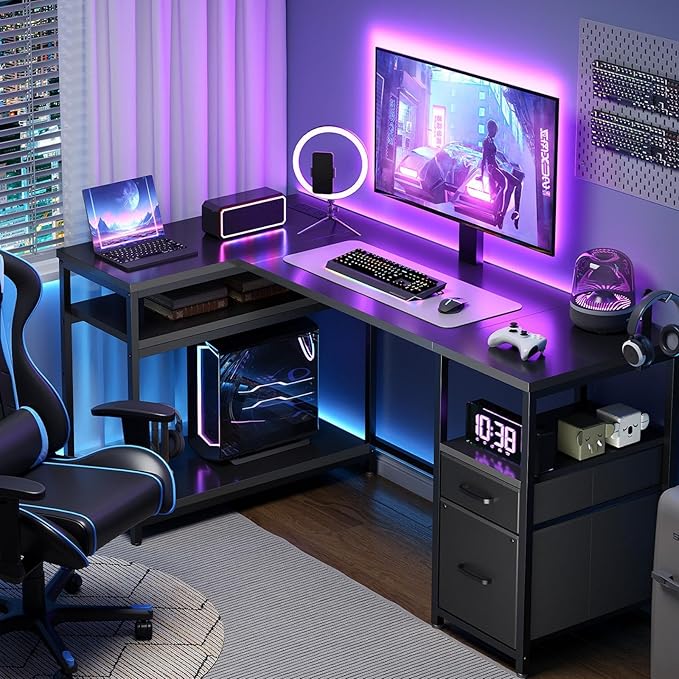 L Shaped Computer Desk with Adjustable Monitor Stand, Gaming Desk with Power Outlets, Office Desk with Fabric Drawer, File Drawer and Hook, for Living Room, Home Office, Black DN03UBB