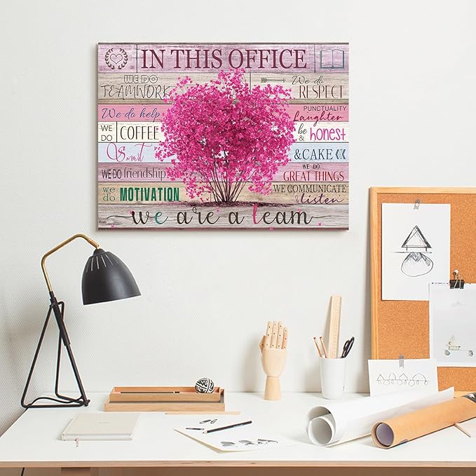 WOWGOOMO Pink Motivational Wall Art for Women Positive Sayings In This Office We Are A Team Flower Tree Picture Poster Modern Entrepreneur Wall Art Home Office Workspace Decoration Framed 12x16 Inch